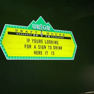 Signage in bar area.
