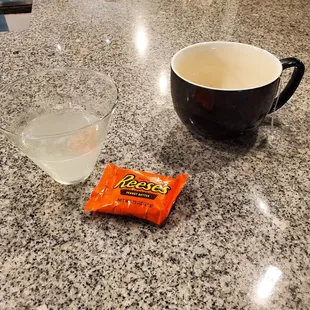 Finished ginger turmeric tea..vodka gimlet and Halloween treat..reese&apos;s cup candy...