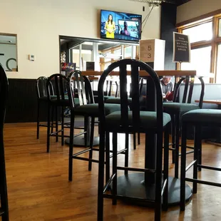 a row of chairs in a restaurant