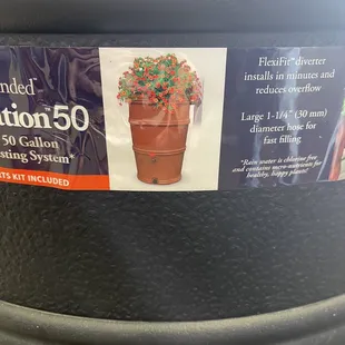 Here's a rain barrel kit that comes with most of what you need to divert some water from a downspout to the barrel.