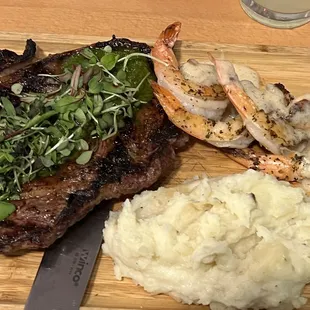 steak, mashed potatoes, and shrimp