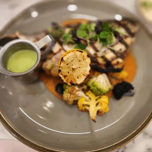 Baby this branzinoand cauliflower medley with lil sauce was perfection..