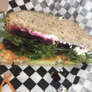 The veggie sandwich is amazing!! The beets are a perfect feature. Normally comes with tomatoes as well, but I got mine without.