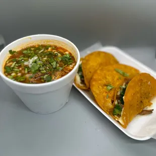 a plate of tortillas and a bowl of soup