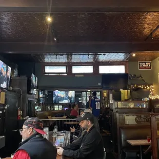 people sitting at the bar