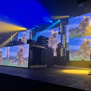 a man on a stage performing