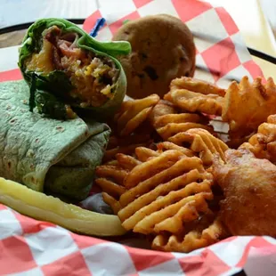 a plate of food with fries and a sandwich
