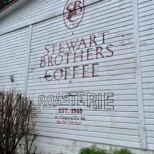 Vashon Roasterie with original Stewart Brothers Coffee signage on the building.