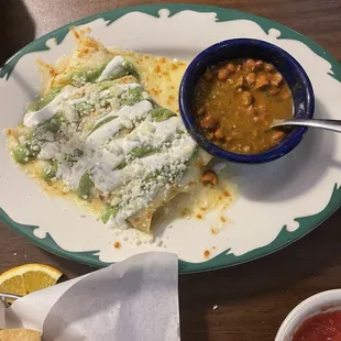 Avocado enchiladas, i am not a fan of crema. Presentation was on point and i was told they were yummy and would definitely go again.