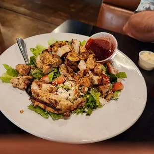 This is a salad with strawberries, feta and grilled chicken. The chicken didn't disappoint, well seasoned and grilled.