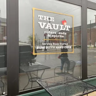 a table and chairs outside of a restaurant