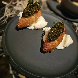 croissant-shaped fried potatoes with caviar and crème fraîche