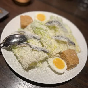 Caesar salad with sardines