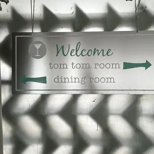 Tom Tom Room this way - sign