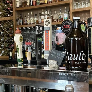 a variety of bottles on the bar