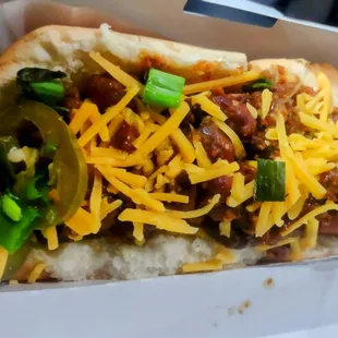 Vegan Hotdog with chili, cheese and jalapenos.