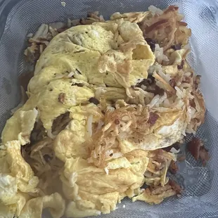 Potato omelette that was thrown in the container like shit!!