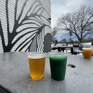 two glasses of beer on a table