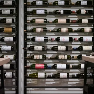 You will be seated in and amongst our wine selection