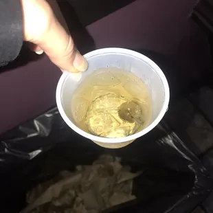 a person holding a bowl of food