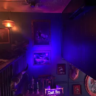 a dark room with purple lighting