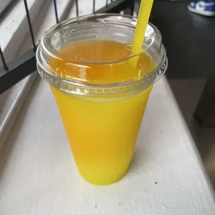 a drink in a plastic cup