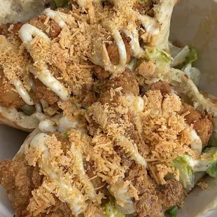 Chicken caesar sandwich comes in a fluffy pita.