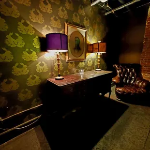 a leather chair and a desk