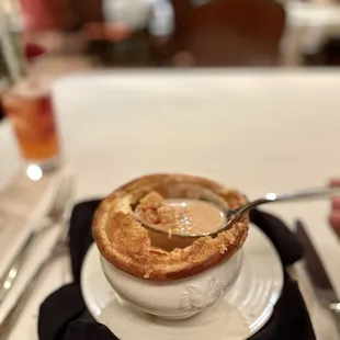 a bowl of soup on a plate