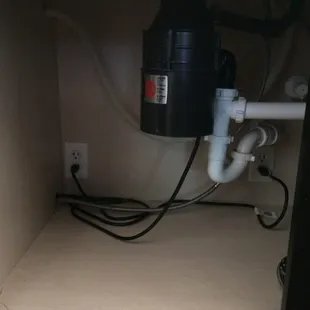Under the kitchen sink cabinet