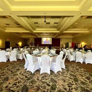 Table set up- she has her own tablecloths, chair covers, placemats, chargers and table top decor.