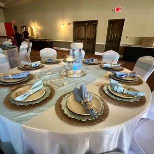Beautiful table decor - tablecloths, runners, napkins, placemats , charger plates and center pieces to match chosen theme.