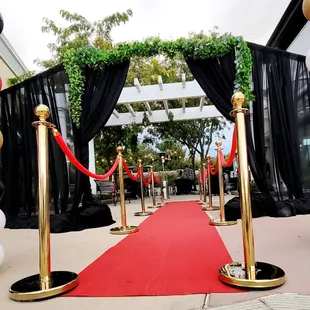 Grand entrance with black curtains