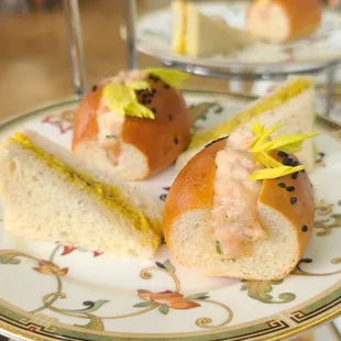 Curried chicken sandwich with green apples on white bread; Hawaii smoked fish baguette