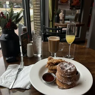 Chicken &amp; Waffles with an almond milk latte and mimosa.