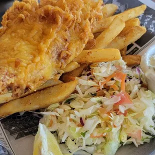 Tempura fish with fries.