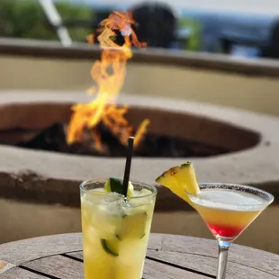 two cocktails on a table