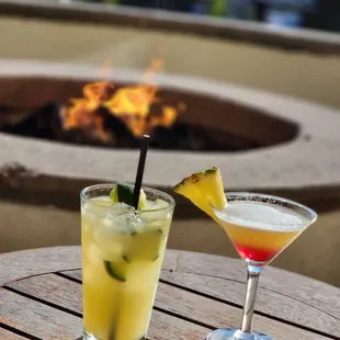 two cocktails on a table