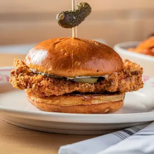 a fried chicken sandwich on a plate