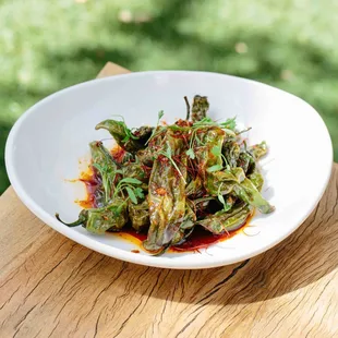 a plate of food on a wooden table