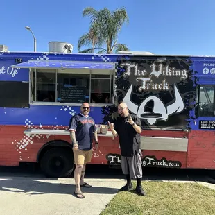 The food truck and one of the owners.