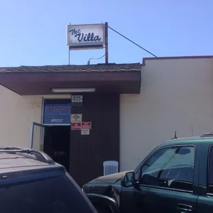 cars parked outside of the building