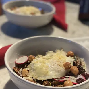The large Fried Brussels Spouts Salad split into two - with fried egg, radish, dried cherry, and (hazel?)nuts. Good but filling!