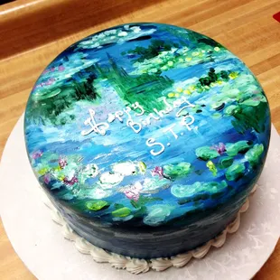 A 12&quot; round cake with fondant icing. The cake is hand paitned with food color paste gels. It is a copy of the Monet &quot;water lillies&quot;