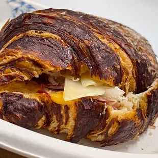 a croissant sandwich on a plate
