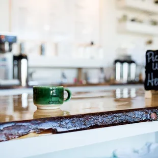 a cup of coffee on the counter
