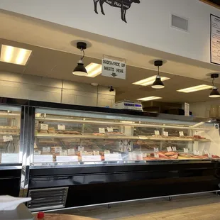 a woman standing in front of the counter