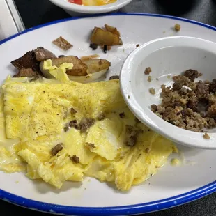 an omelet and a bowl of food