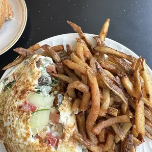 Egg white veggie omelet and french fries