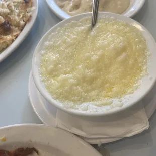 a bowl of soup and a plate of food